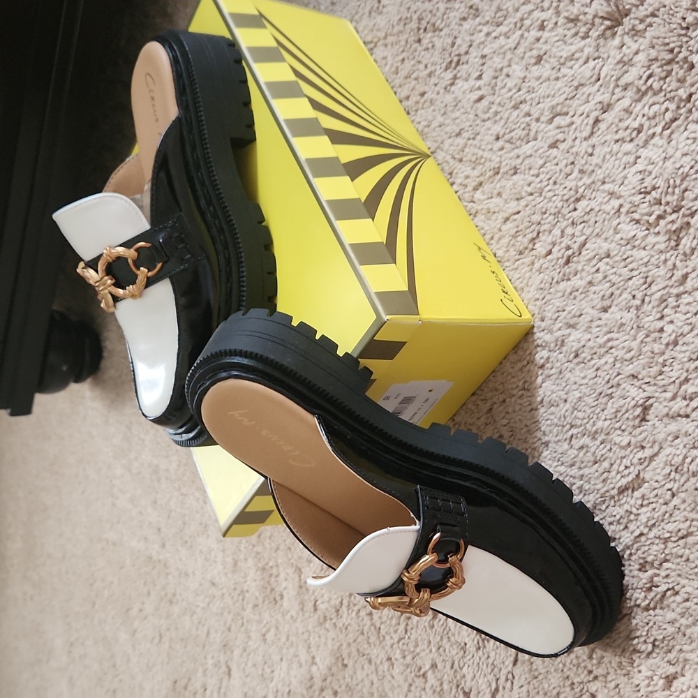 Lug sole loafers, black and white with buckle, these are new with the box,no tag